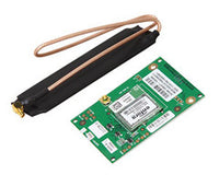 2GIG Cell Radio Module with green circuit board and black external antenna with copper connector and wrist strap