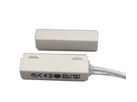 White magnetic contact sensor with 3/8 inch gap, press-fit design, showing cable attachment and certification markings