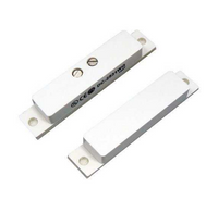AI NEXT DC-2531 white magnetic contact sensor pair with mounting brackets and screw terminals