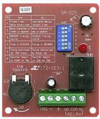 SECO-LARM Enforcer SA-025 programmable timer module with blue relay switches, terminal connectors, and control circuitry