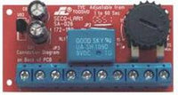 SECO-LARM Enforcer red circuit board timer module with relay, capacitors, and adjustable potentiometer for delay control