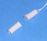 Flair Electronics 3/8 inch stubby recessed magnetic alarm contact in white with attached cable on blue background