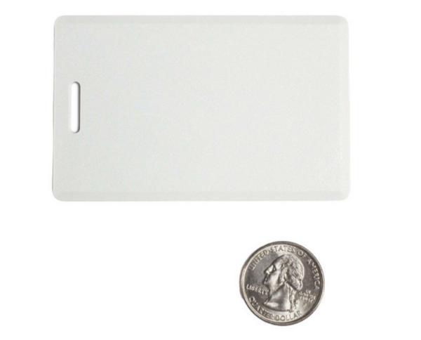 C702-E6G white proximity card with slot and handle shown next to quarter for size reference